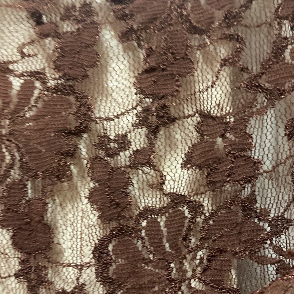 what ; brown ( on the top ) see thru design with flowers with zipper. its cute💫 - Picture 3 of 15